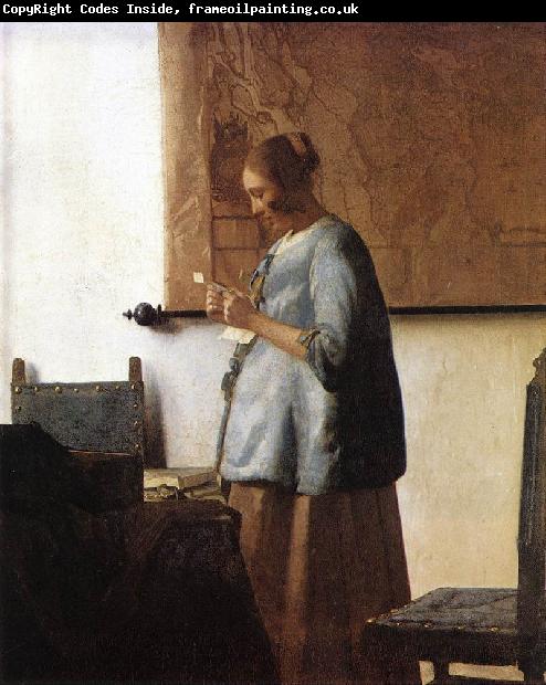 VERMEER VAN DELFT, Jan Woman in Blue Reading a Letter ng