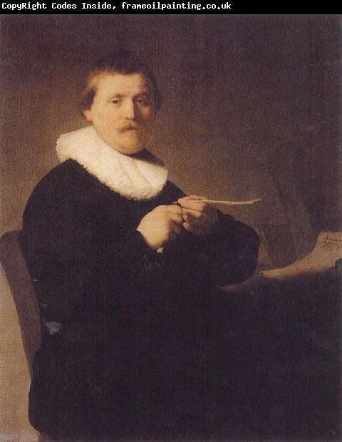 REMBRANDT Harmenszoon van Rijn Young Man Sharpening a Pen