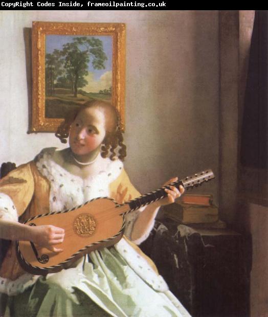 Jan Vermeer Woman is playing Guitar