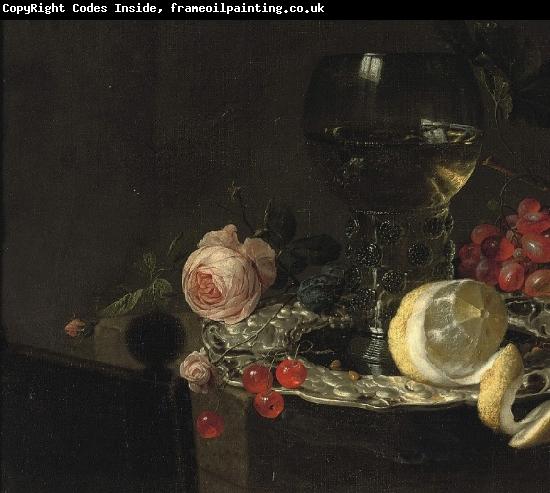 simon luttichuys A 'Roemer' with white wine, a partially peeled lemon, cherries and other fruit on a silver plate with a rose and grapes on a stone ledge